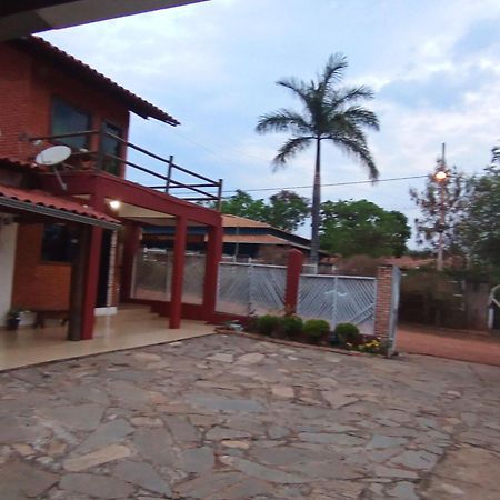 Pousada Central Santana Do Riacho Esterno foto