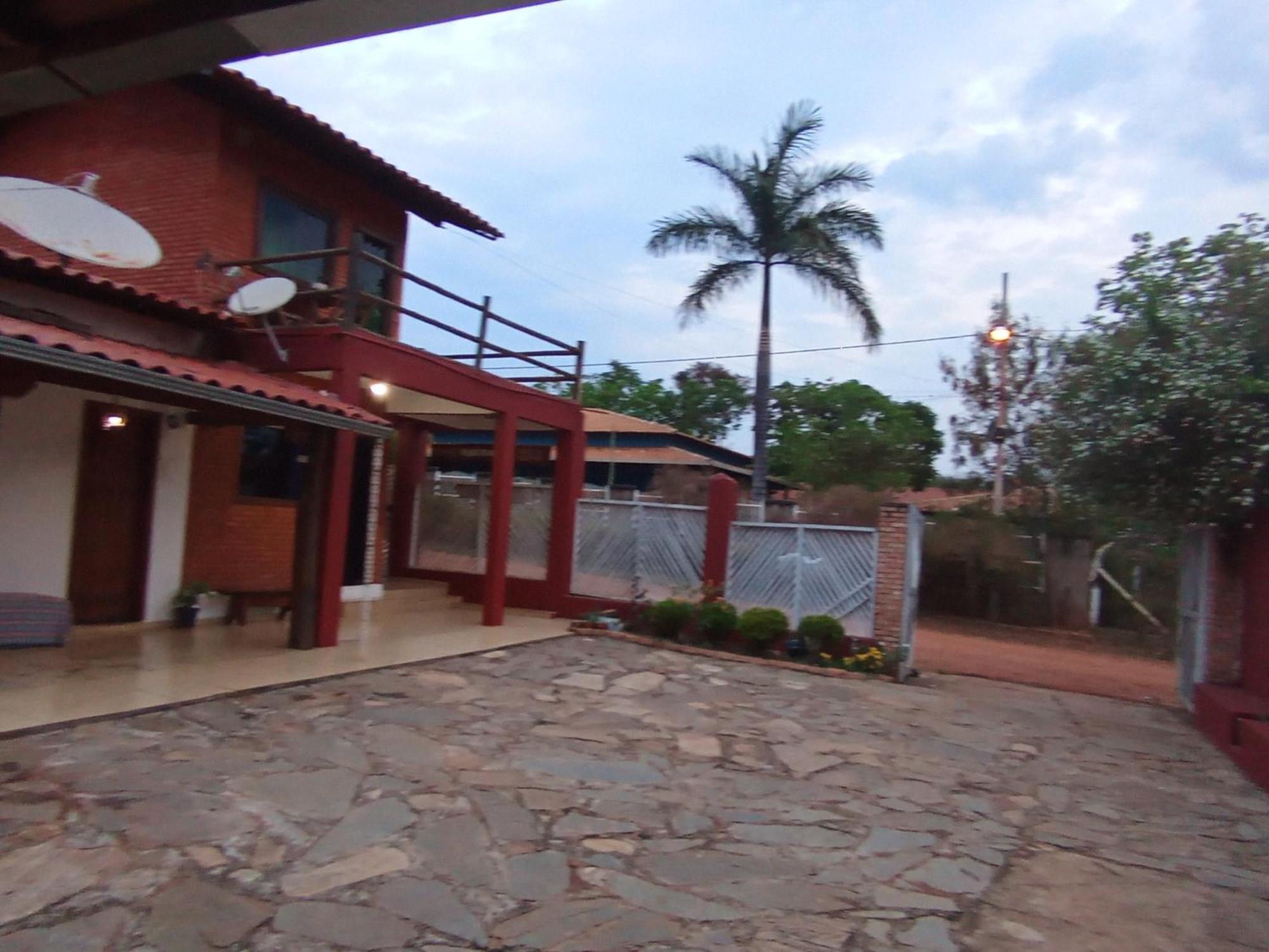 Pousada Central Santana Do Riacho Esterno foto